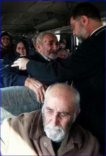 Vapautetut kristityt bussissa matkalla Tel Tamariin. Kuva: World Watch Monitor